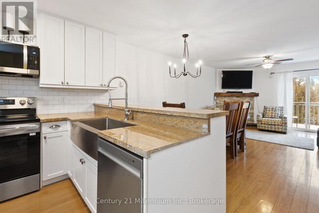 Photo du bâtiment - 100 Alice St W