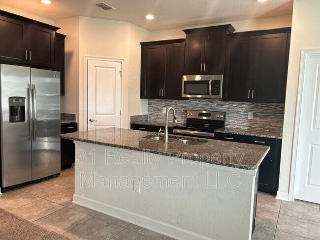 Foto del edificio - 11114 Sycamore Woods Dr