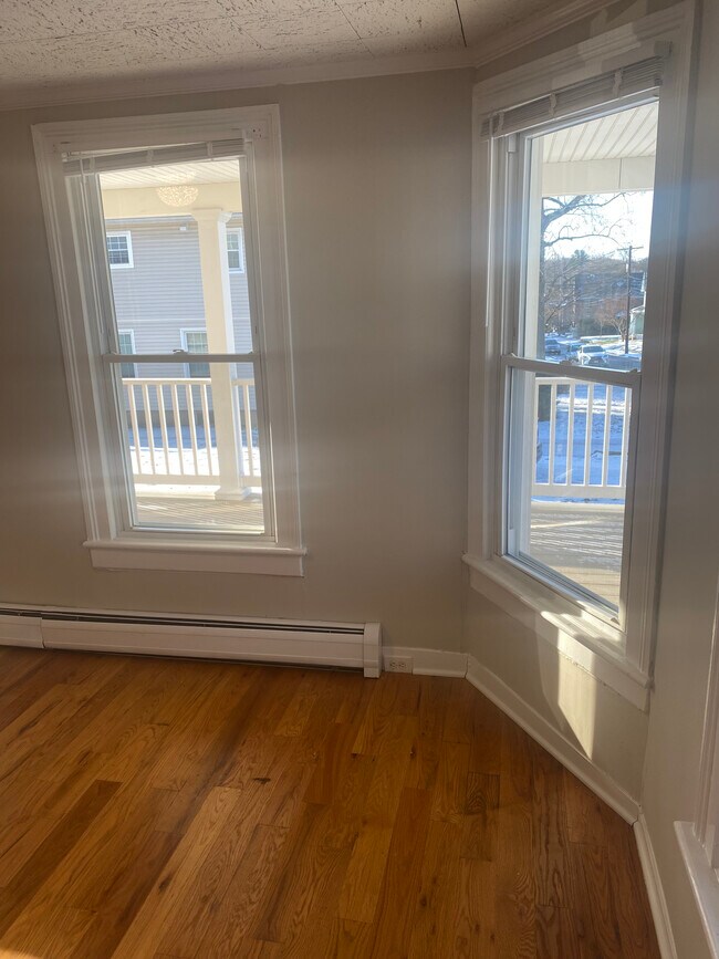 View porch from living room - 90 Cottage St
