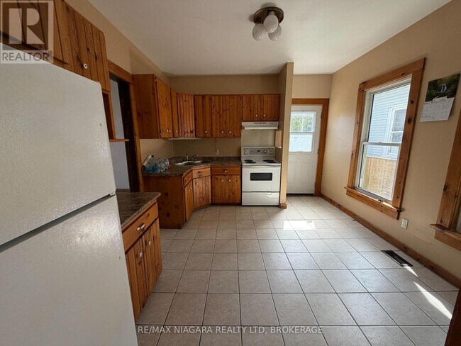 Photo du bâtiment - 4712 Cookman Crescent