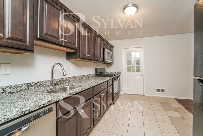 Building Photo - Enjoy living the good life in this 4 bedro...