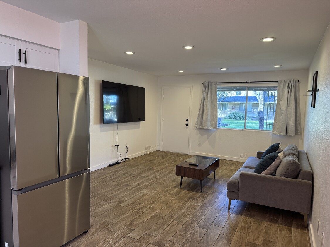 Living Room - 75 inch TV Included Per Renter's Preference - 6819 N 12th St