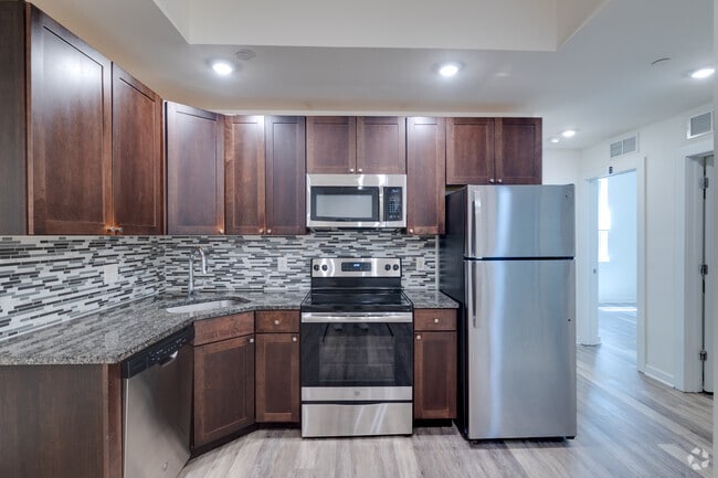 3BR, 2BA Standard - Kitchen - The Eleanor at Chestnut (Per Bedroom Lease) Apartments