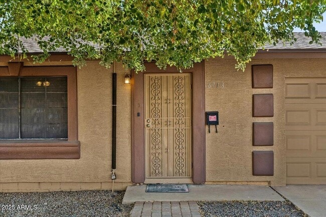 Building Photo - 6713 N 63rd Ave