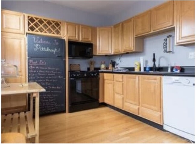 Kitchen with gas range & dishwasher - 3611 Purdue St