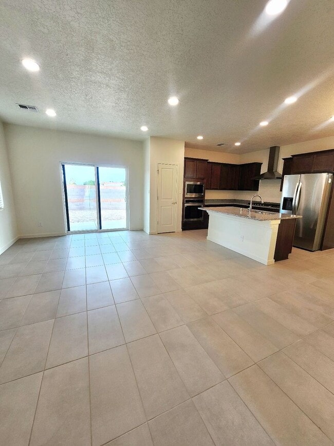 Building Photo - Brand-New Construction Townhome – Never Li...