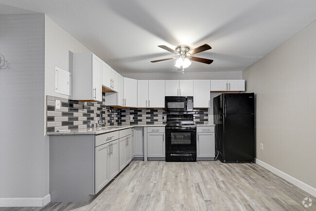 Building Photo - Brand-New 2 Bedroom - Newly Renovated, Rea...