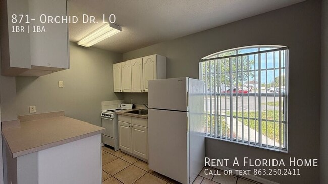 Building Photo - 871- Orchid Dr. LO-