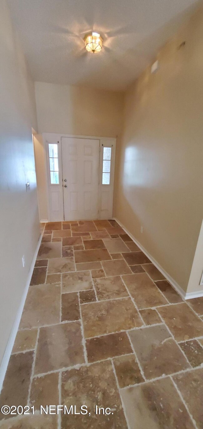 Building Photo - 1700 Canopy Oaks Dr