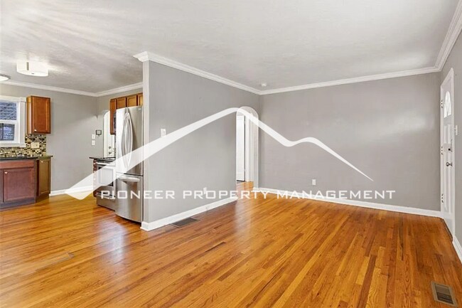 Building Photo - Downtown Charm with Private Yard, Oversized Garage and AC