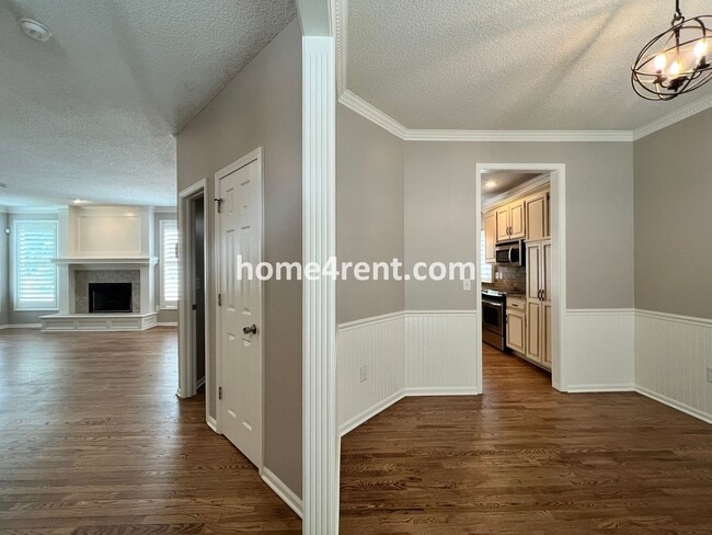 Building Photo - Updated Kitchen, Large Two Tiered Deck, Finished Basement in Blue Valley Schools!