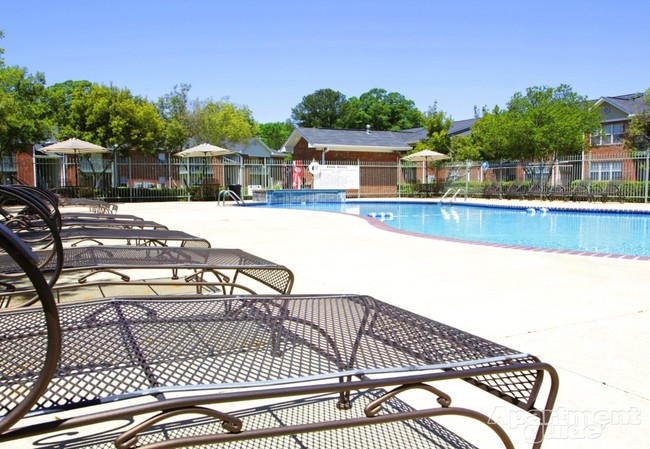 Spacious Sundeck with Loungers - Forest Trail Apartment Homes