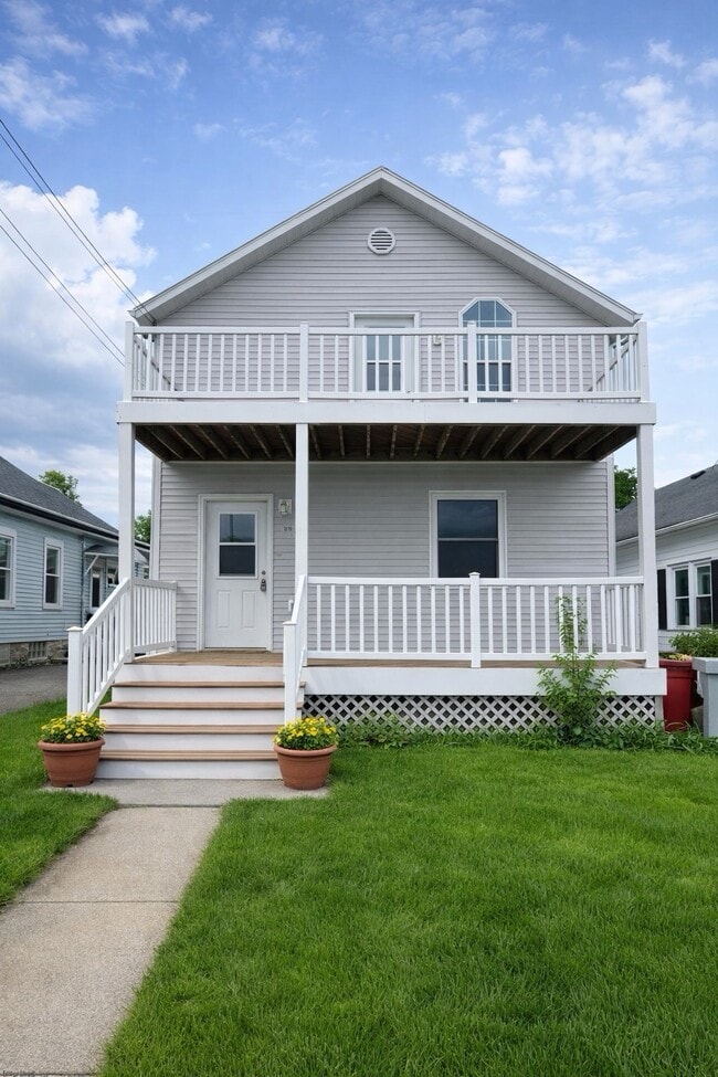 Bright and spacious living room inside this pet-friendly 2-bedroom apartment for rent in Antigo, WI. - 1016 4th Ave