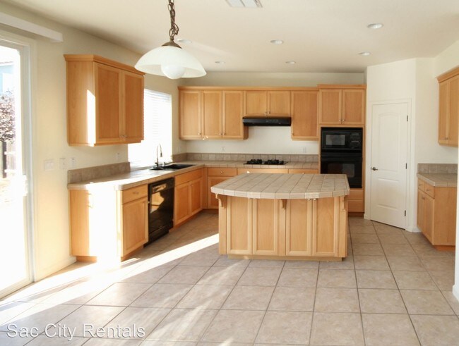 Building Photo - 4 br, 2.5 bath House - 6610 Timkir Way