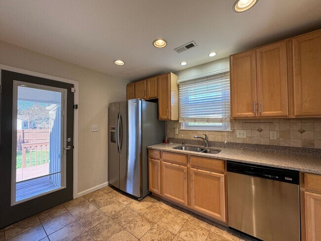 Building Photo - Welcome to this charming bungalow-style ho...