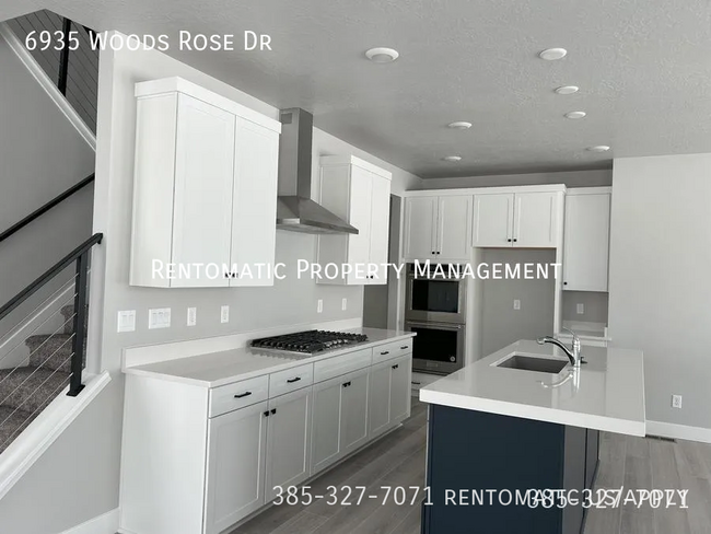 Foto del edificio - 6935 Woods Rose Dr