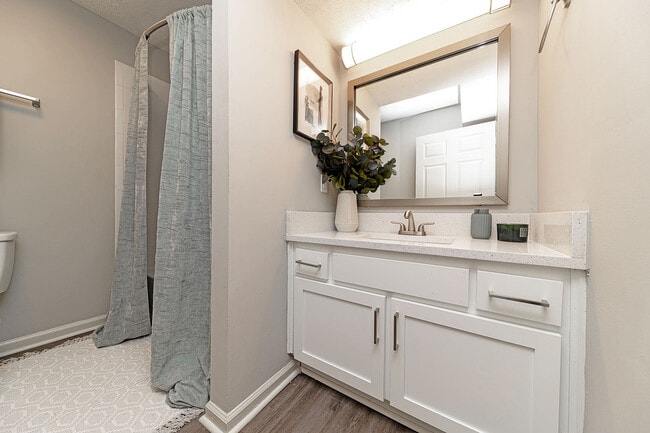 Bright bathroom with quartz counters and modern cabinetry - Vetra Providence