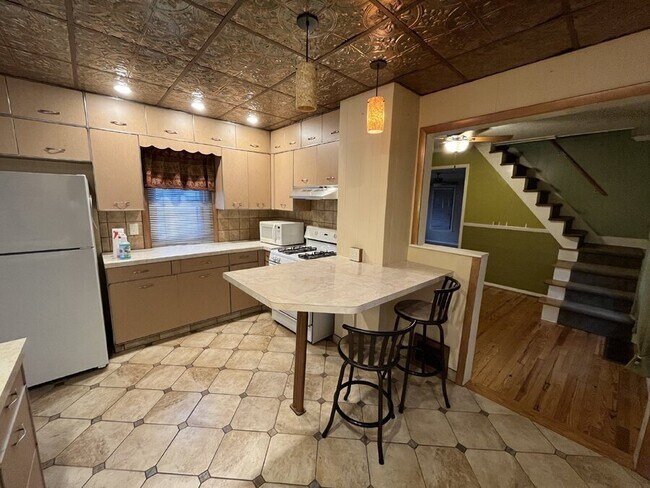 Foto del edificio - 4909 E 71st St