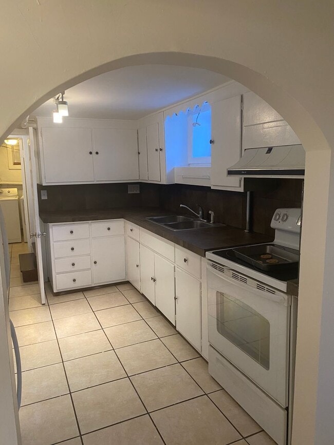 Photo - 2 Bed / 1 Bath Garden-Level Apartment – Available Early April!