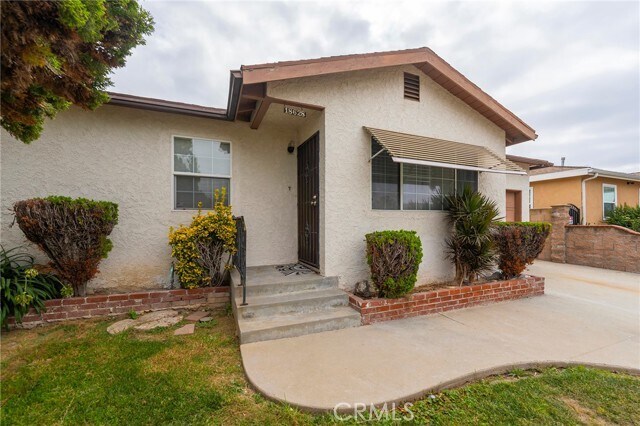 Building Photo - 18628 Mettler Ave