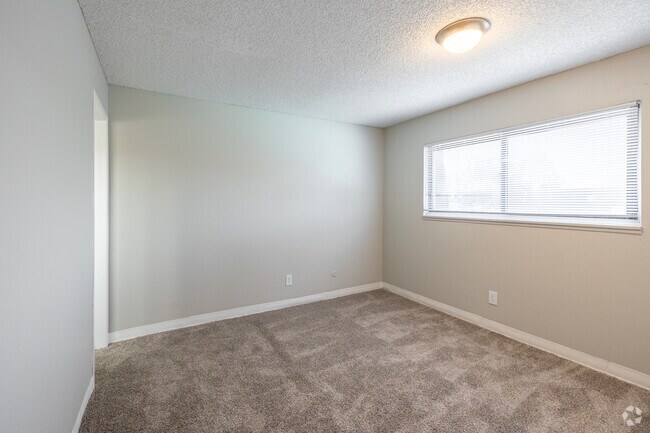 3 habitaciones, 2 baños - 1074 pies cuadrados - Dormitorio principal - The Meadows at Town Center