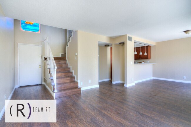 Building Photo - Charming Townhouse in a Gated Community