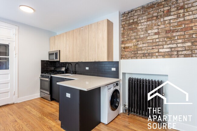 Foto del edificio - 4011 N Lowell Ave