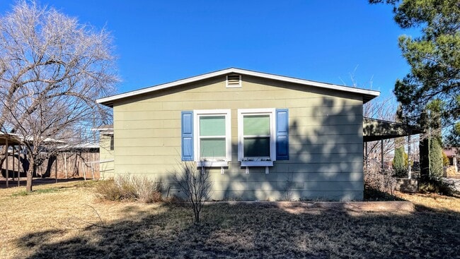 Building Photo - Your New Snyder Sanctuary: Modern Updates, Massive Storage & a Cozy Porch