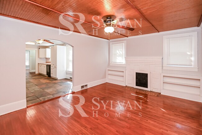 Building Photo - The living is easy in this 4 bedroom, 2 ba...