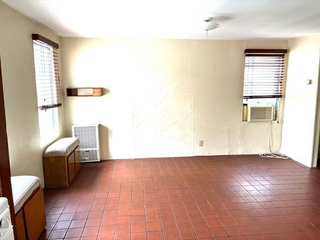 L.R. Looking West with heat and air unit . - 1001 N Sierra Bonita Ave
