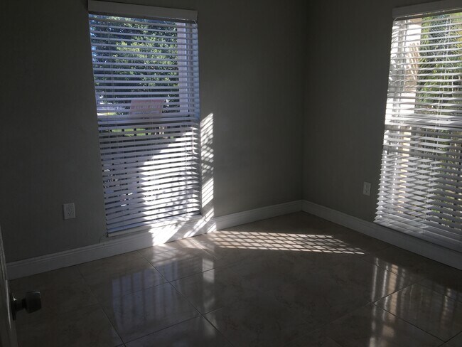 Building Photo - 241 S Royal Poinciana Blvd