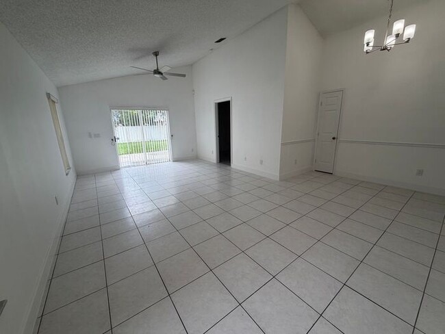 Photo - 3 Bedroom, 2 Bathroom East Orlando Home with Garage & Large Fenced Backyard!