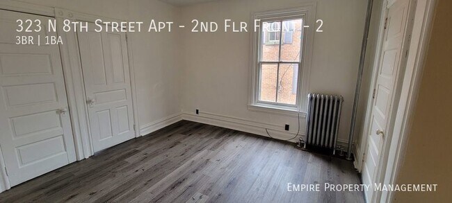 Building Photo - 2nd Floor: 3 Bedroom / 1 Bathroom Apartmen...