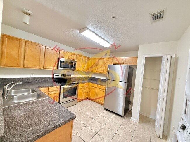 Building Photo - Manotak Oaks - 3/2 Upstairs Condo