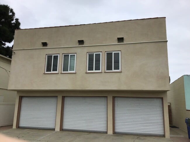 Outside parking in front of left garage - 232 Avenue G