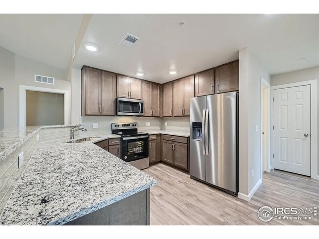 Building Photo - Brand New! 2Br/2Ba Condo with 2-Car Garage