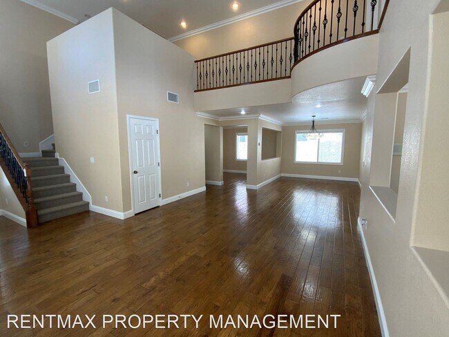 Building Photo - 3 br, 2.5 bath House - 5550 GOLDEN PALMS CT