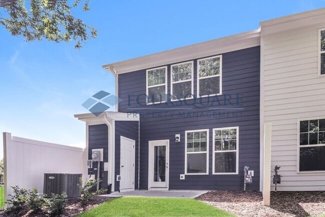 Building Photo - End Unit Townhome | Back Patio with Privac...