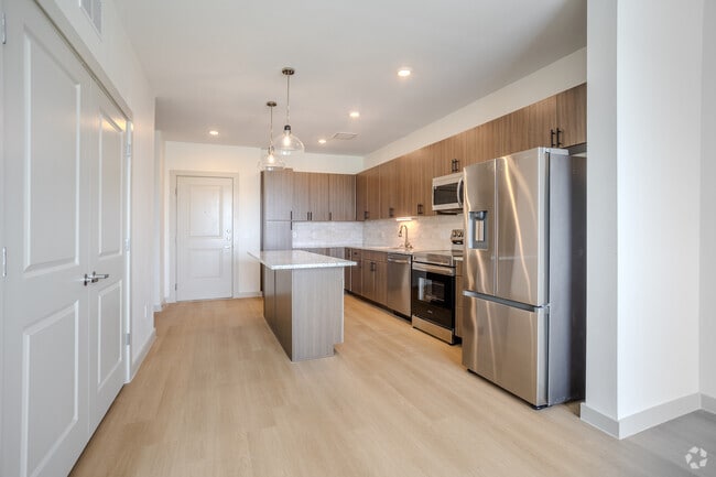 1BR, 1BA - 687 SF - Bluebonnet Kitchen 2 - Meridian at Wylie - 55+ Affordable Apartments