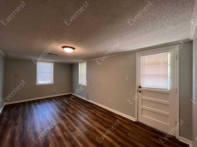 Building Photo - 7077 Carrolton Dr W