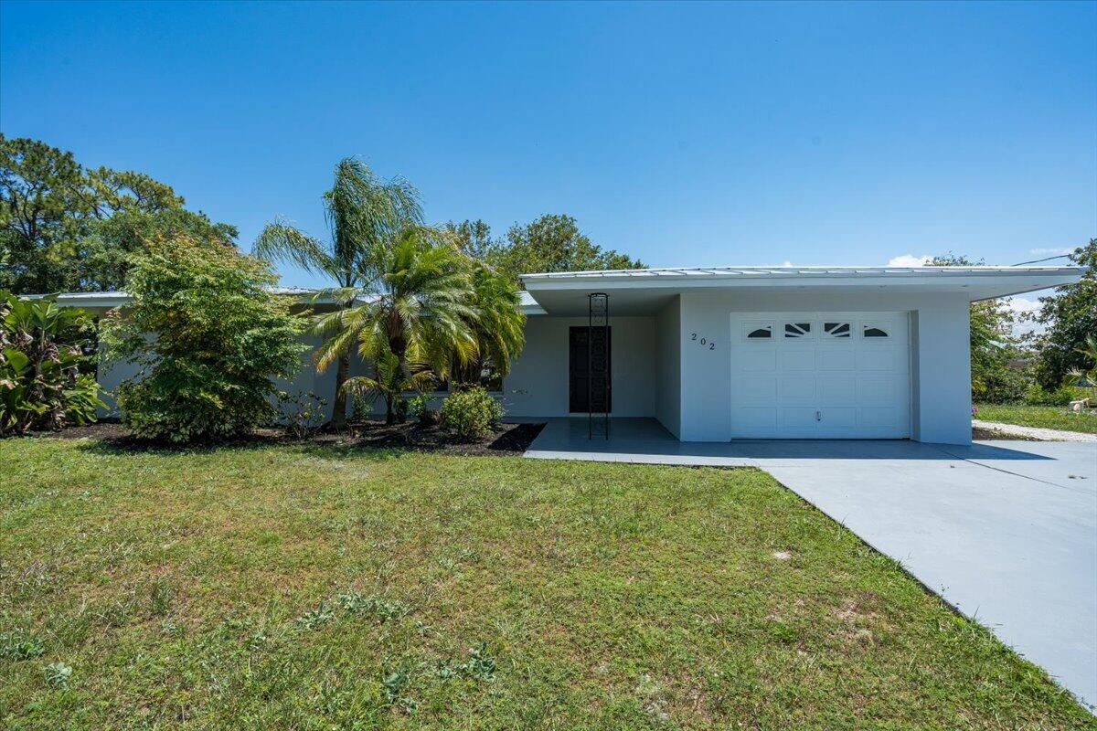 Photo - 202 Bay Street, Port St. Lucie, FL 34952 - 3 BR 2 BA single-family home