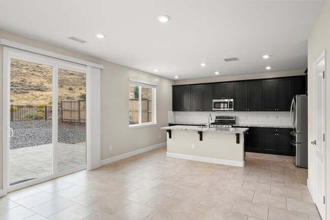 Building Photo - Multi Generational Living with 4 bedrooms ...