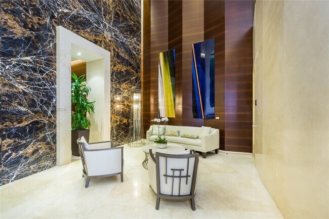 Building Photo - 15811 Collins Ave
