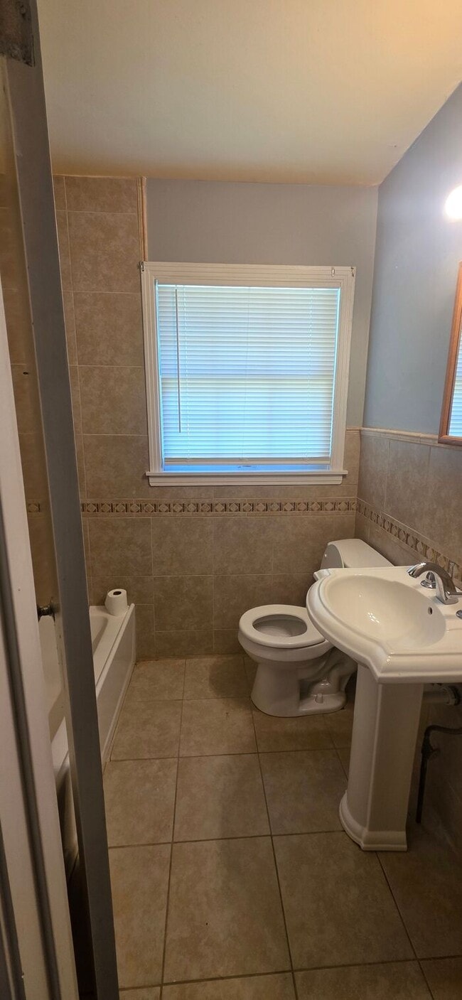 Building Photo - Welcome to 10002_BELMONT, a charming 3-bed...
