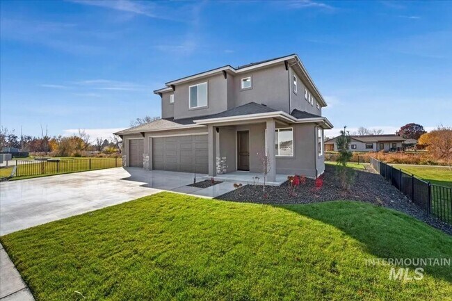 Building Photo - Spacious 4 Bed Home w/ Vaulted Ceilings, Office & Open Layout in Middleton