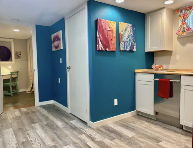 Kitchen, bathroom door, and office area. - 4115 SE Gladstone St