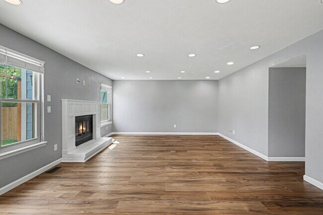 Foto del edificio - Updated 4BR Corner Lot Home with Finished Basement & 2-Car Garage