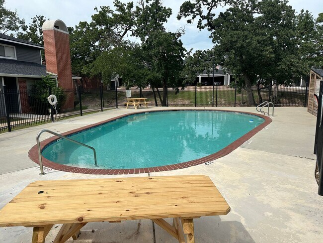 Building Photo - College Station - 2 bedroom / 1.5 bath Condo - 2 story with covered parking - Pool in your front ...
