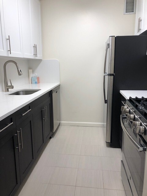 RENOVATED KITCHEN - South Cove Plaza