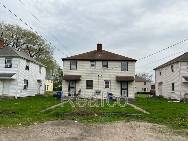 Building Photo - 1310 E 25th Ave